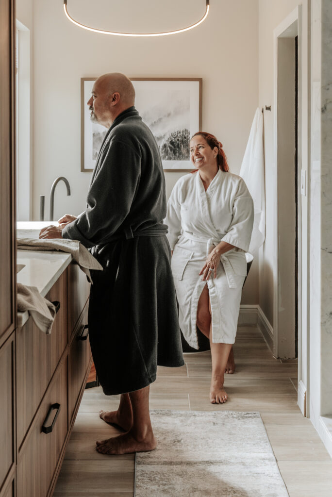 homeowners enjoying their newly renovated master bathroom in their ropes