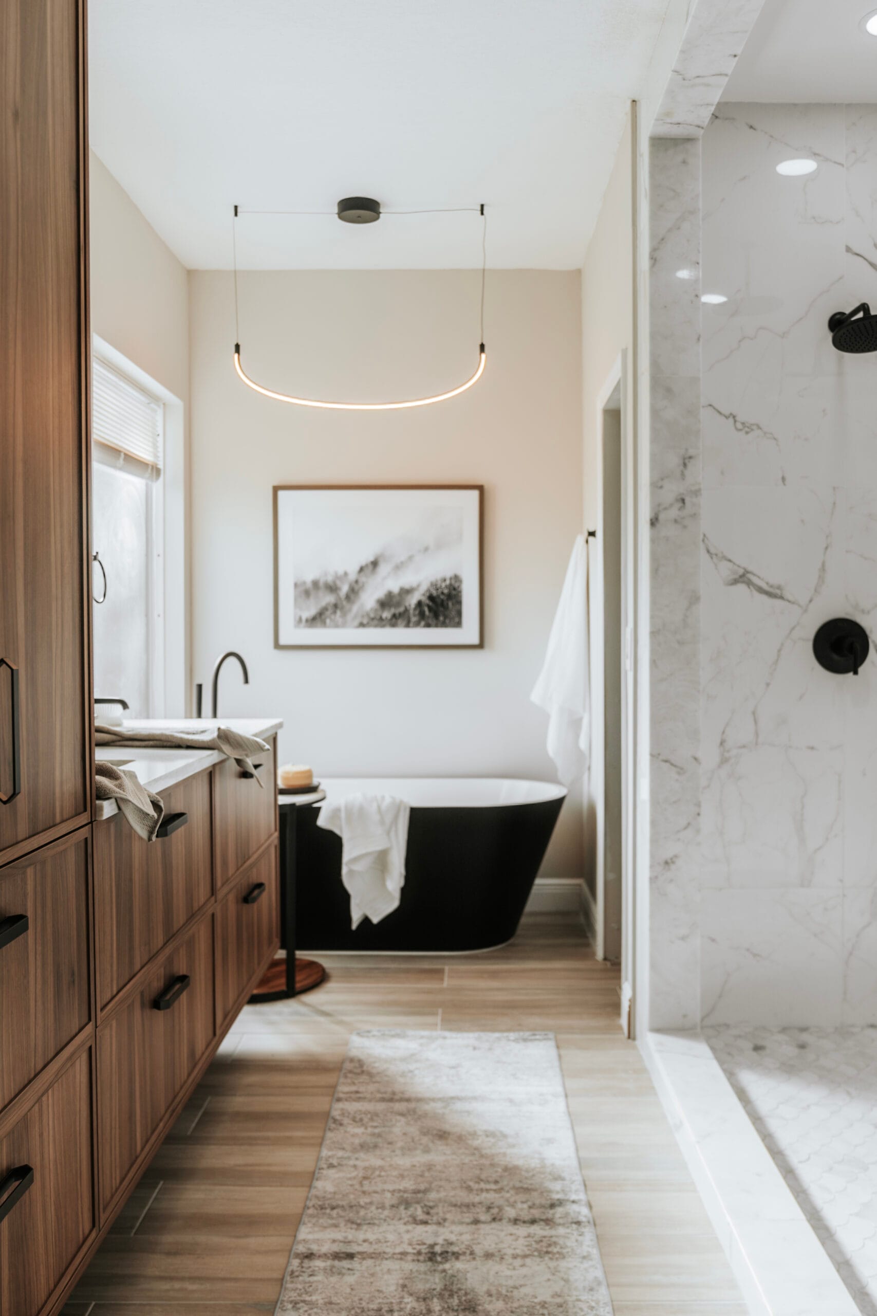 Finished primary bathroom designed by CASA Interiors